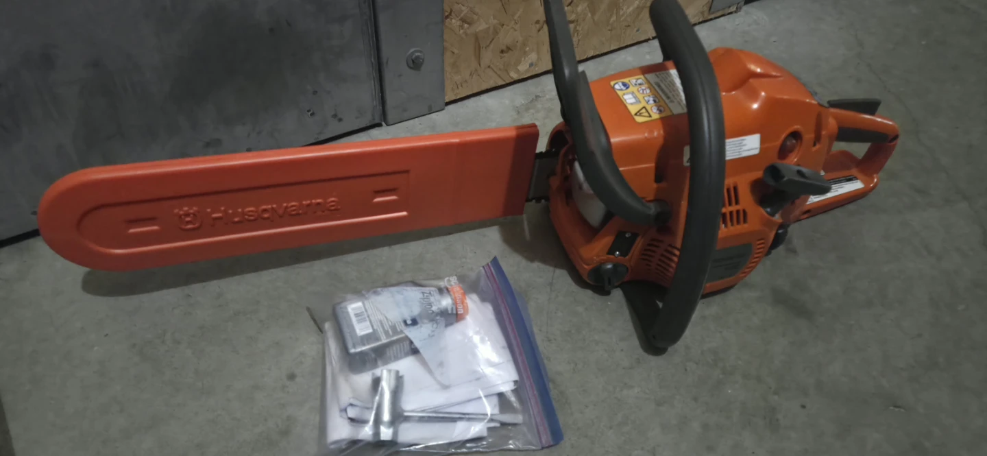 Husqvarna Chainsaw with Bar and Tools