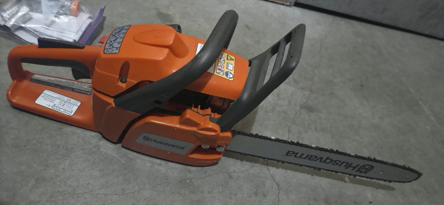 Husqvarna Chainsaw with Bar and Tools - photo 4