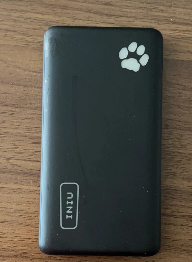 Black INIU Power Bank with Paw Print