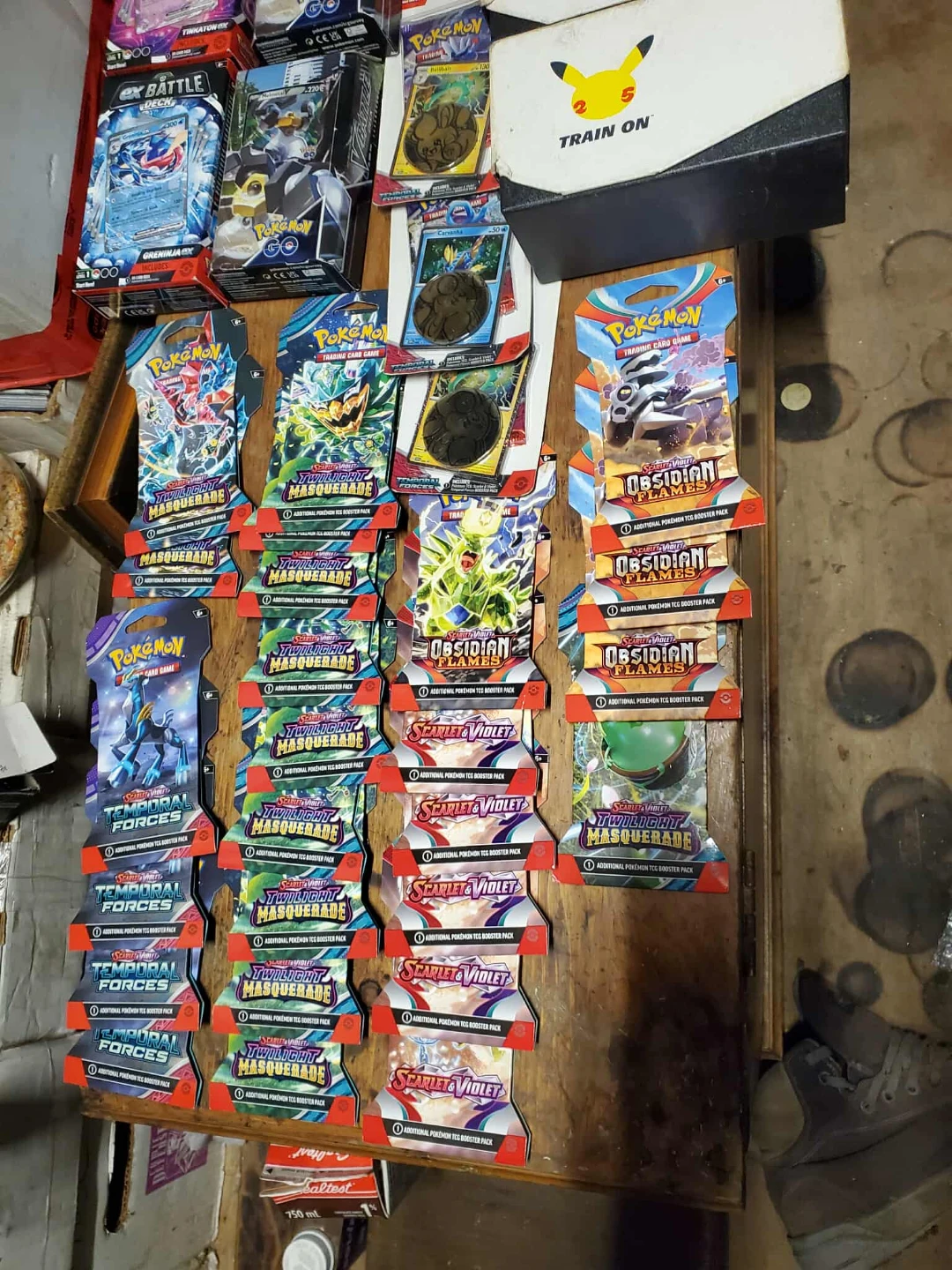 Assorted Pokémon Trading Card Game Booster Packs and Boxes
