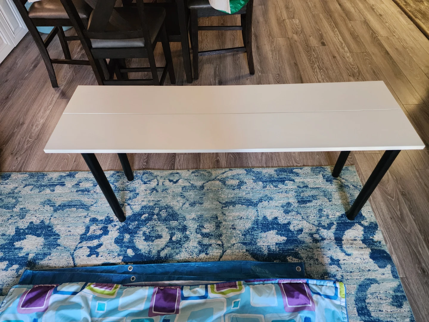 White narrow table with black legs - photo 2