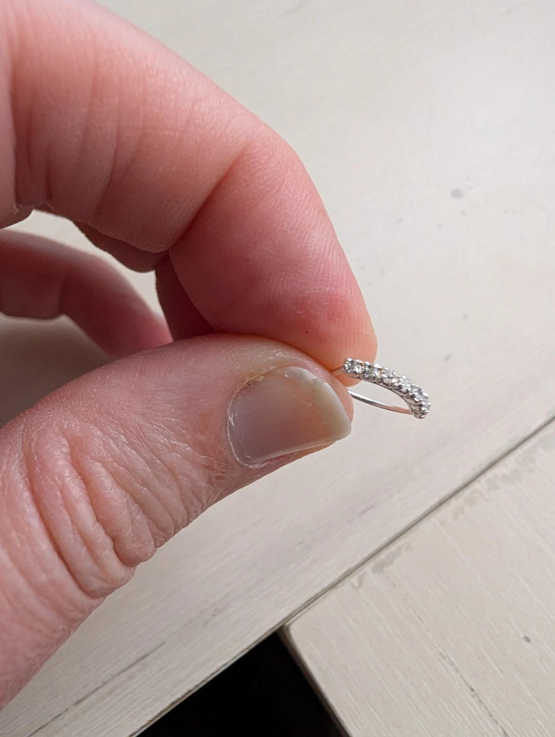 Silver coloured ring with rhinestones - photo 2