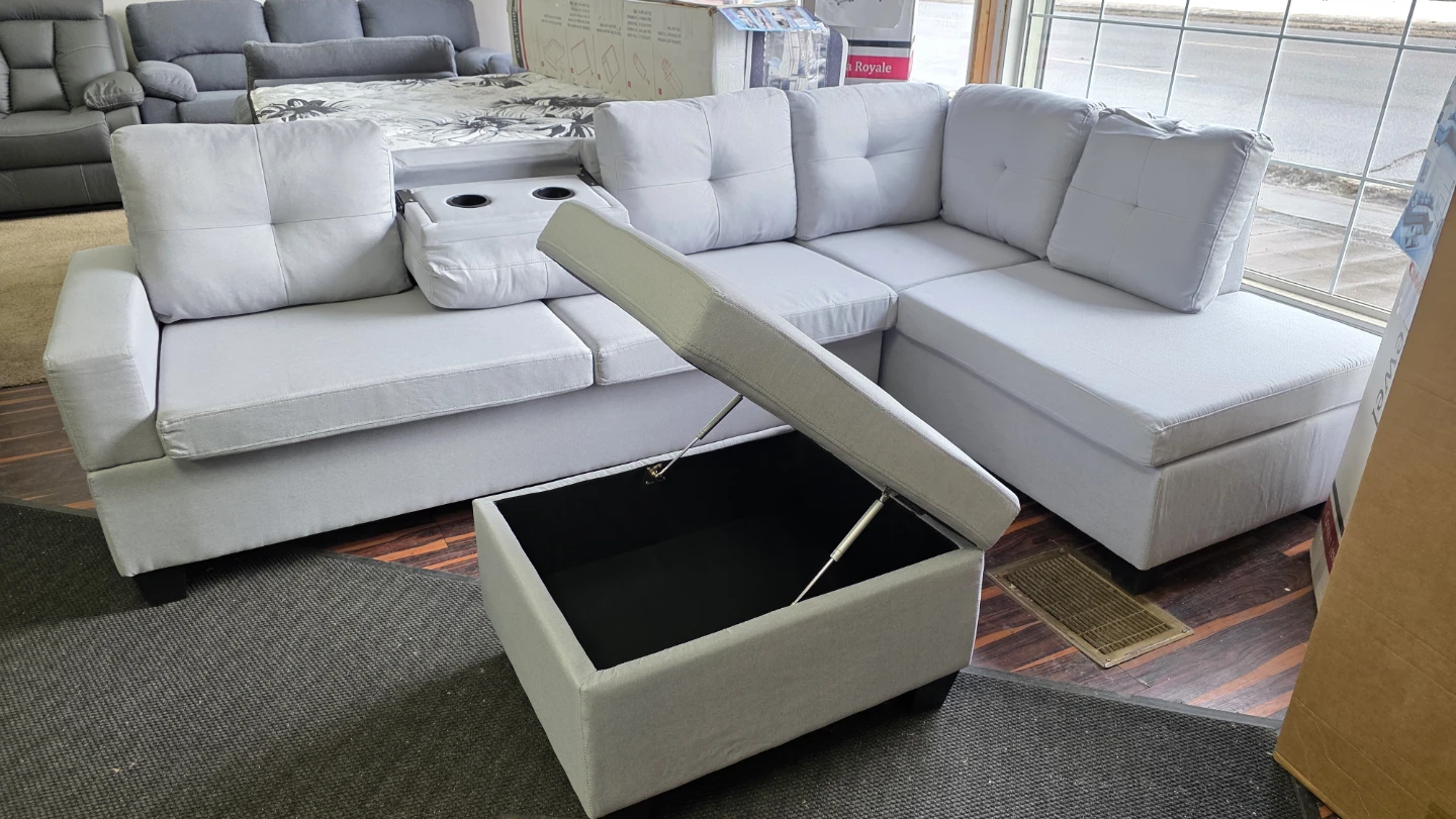 Brand new Grey Sectional Sofa with Storage Ottoman. All sealed
