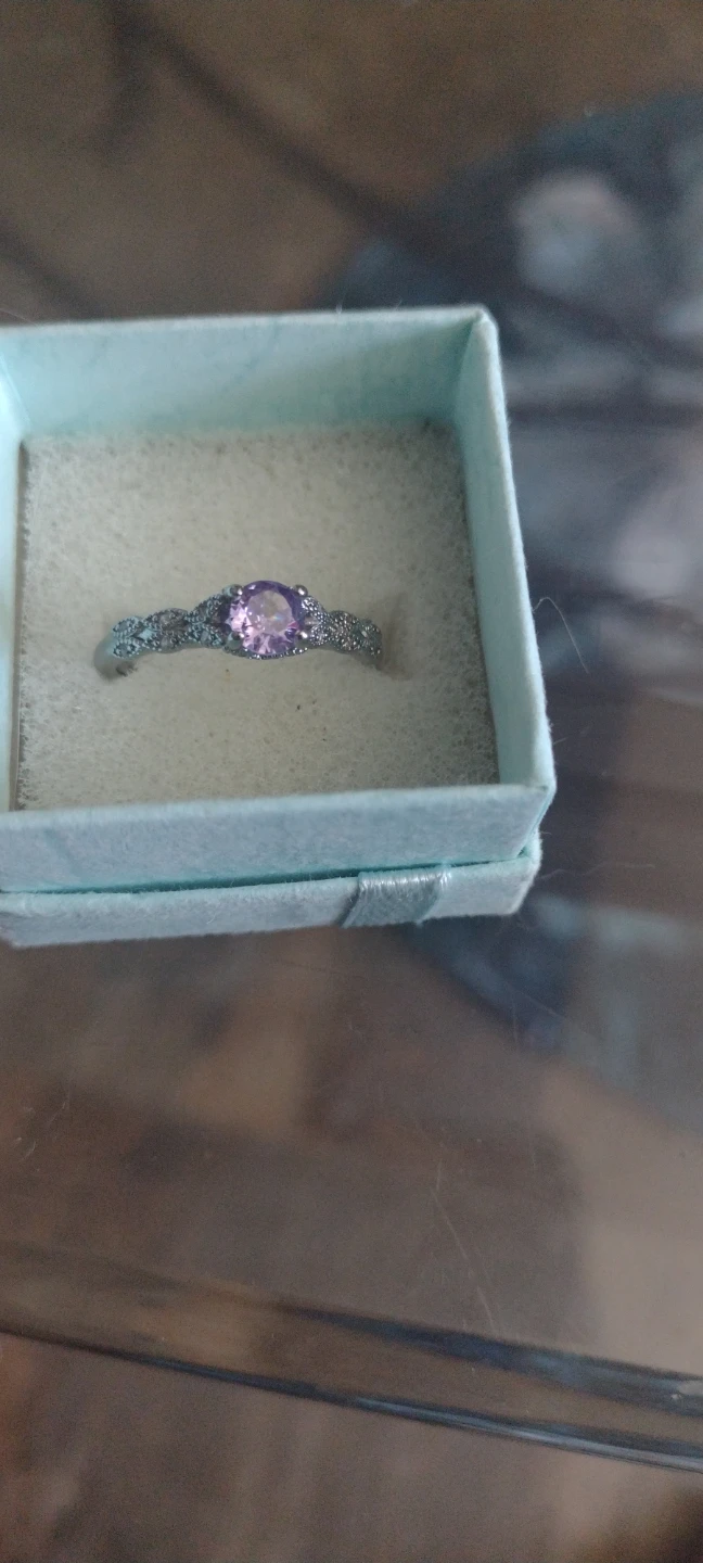 Silver-tone ring with purple stone
