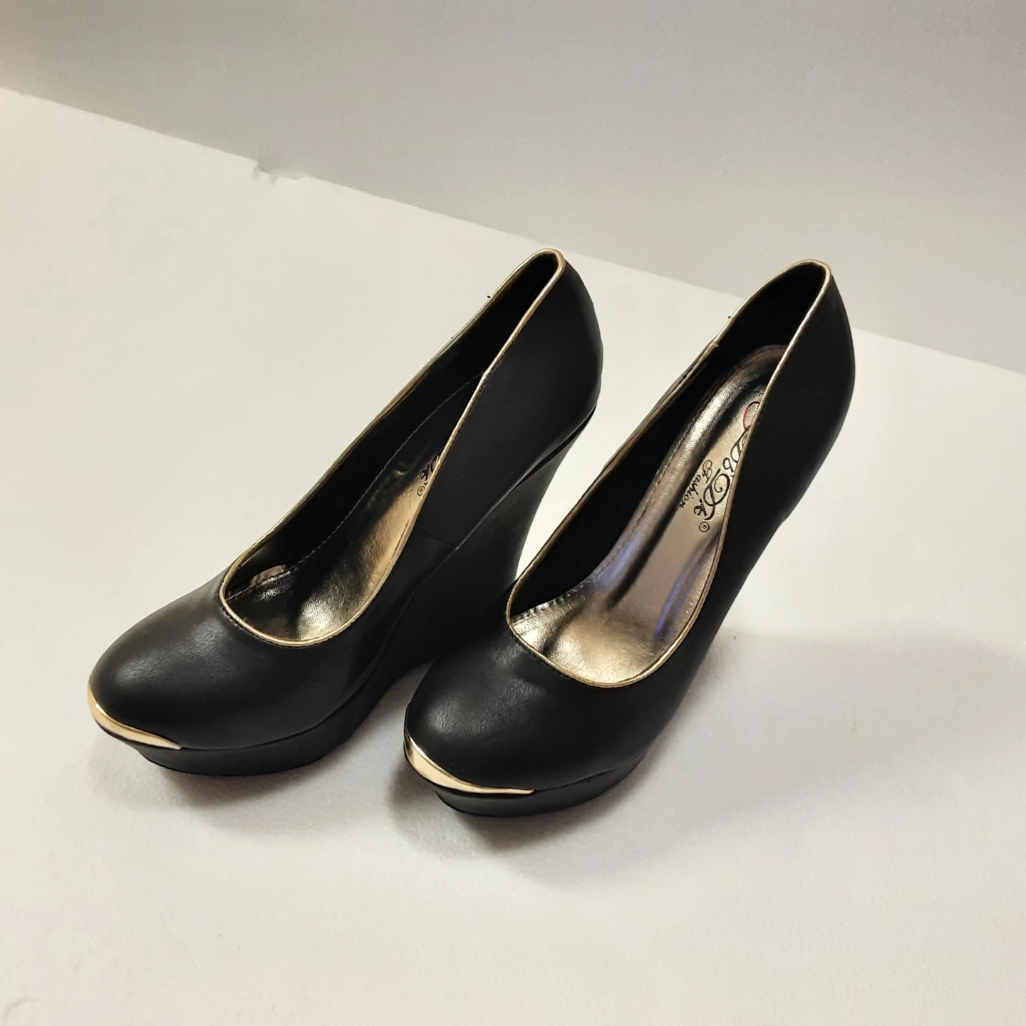 Brand new Black Wedge Heels With Gold Trimming