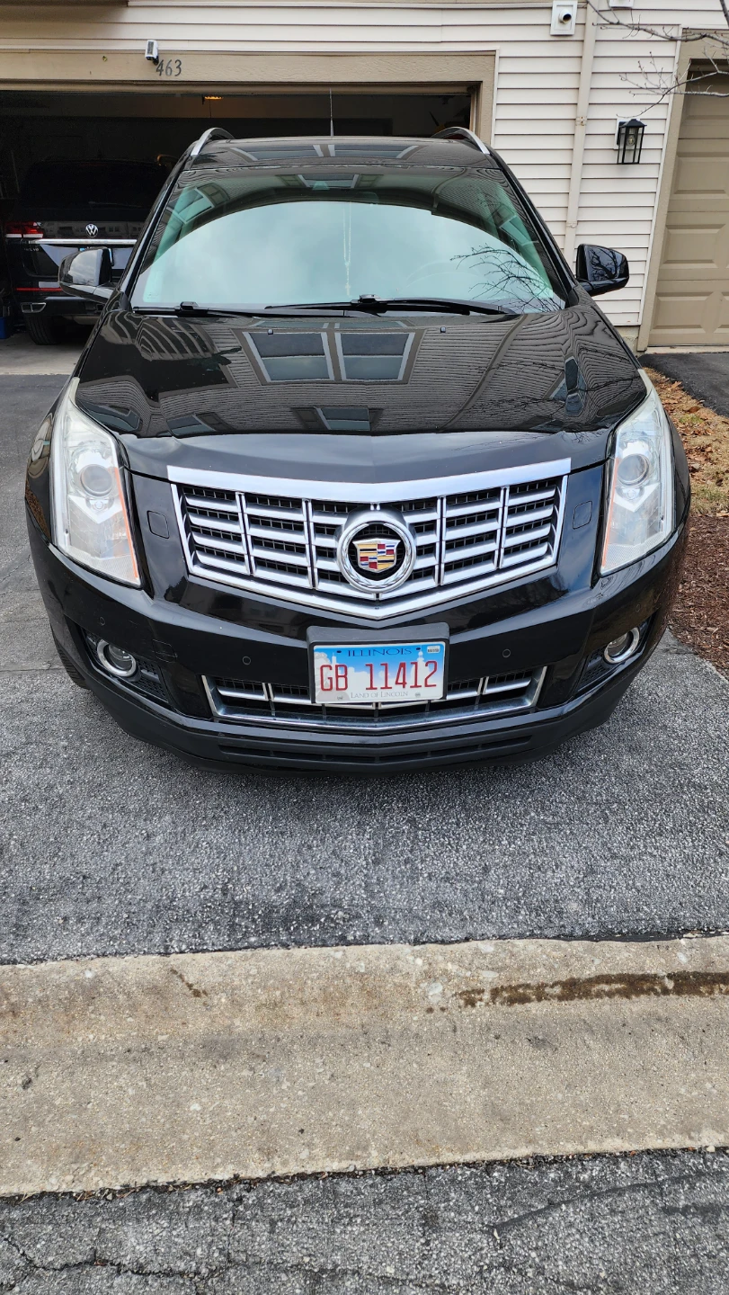 Black Cadillac SRX Luxury AWD SUV
