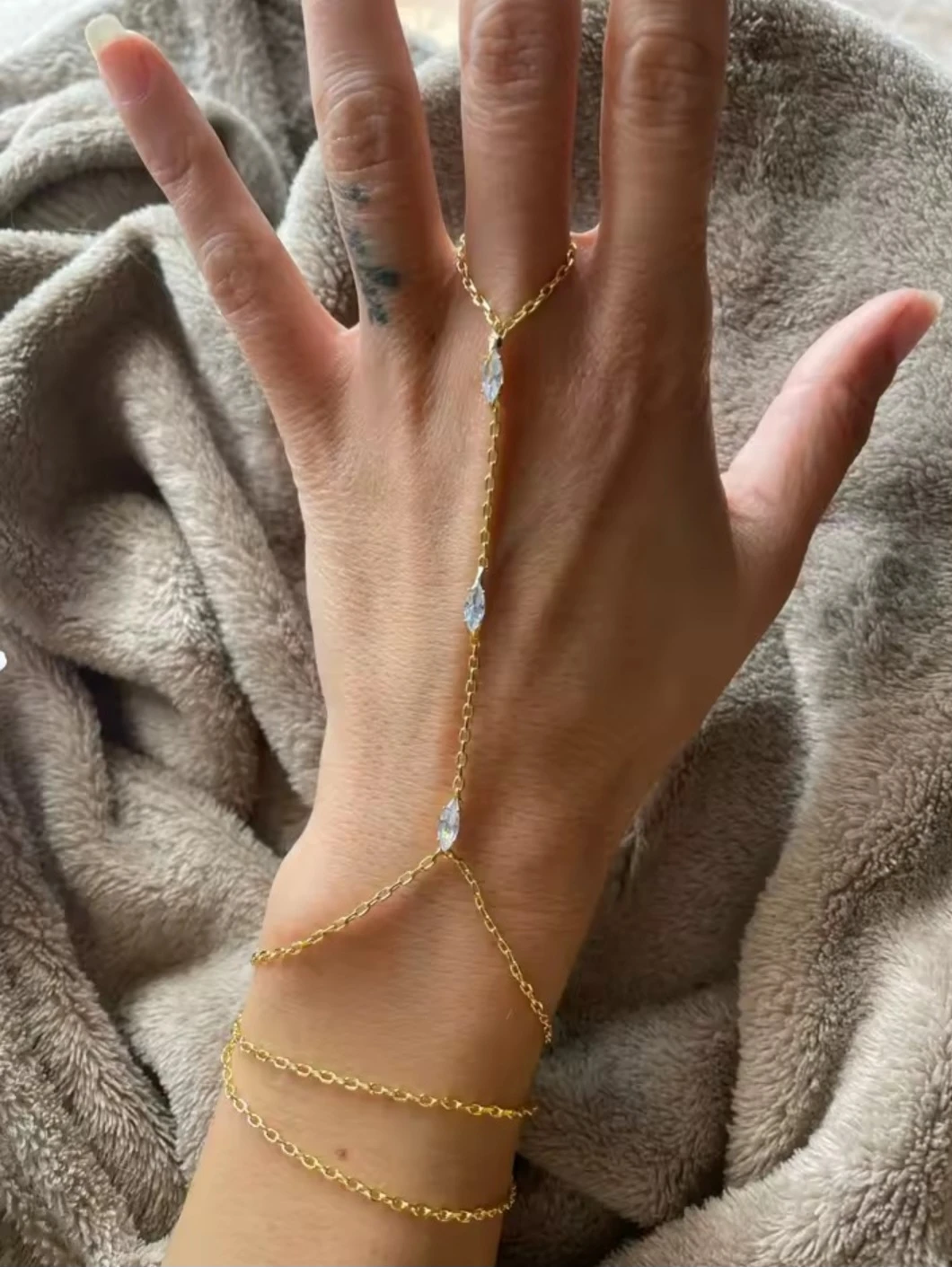 Gold-tone hand chain bracelet