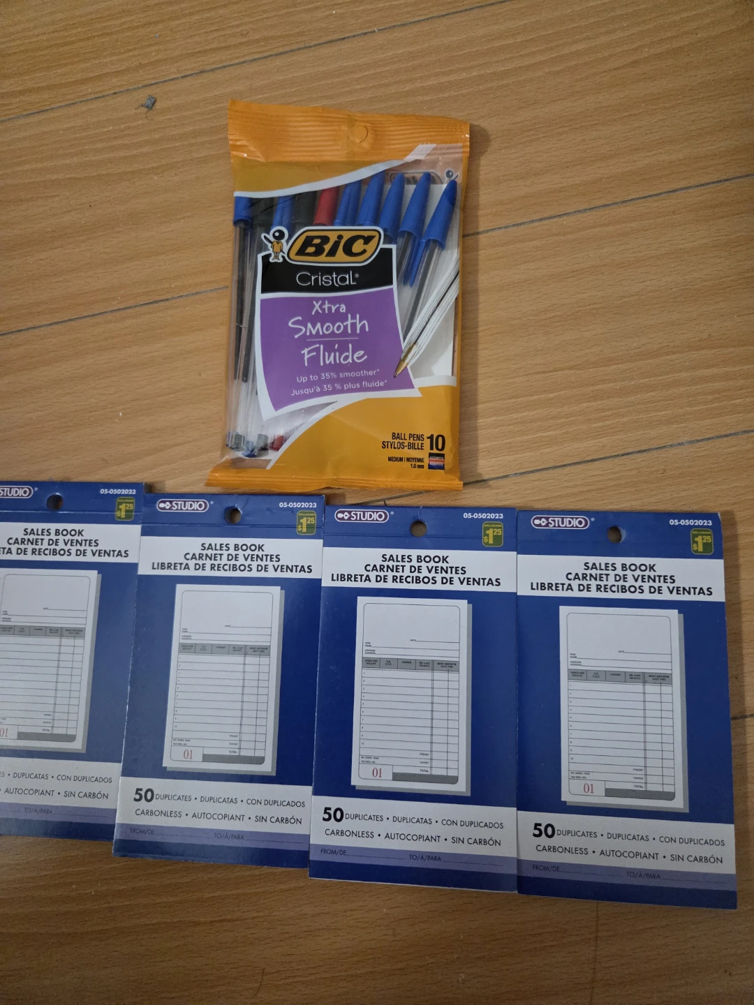 4 sales books (50 Count each) & pack of pens