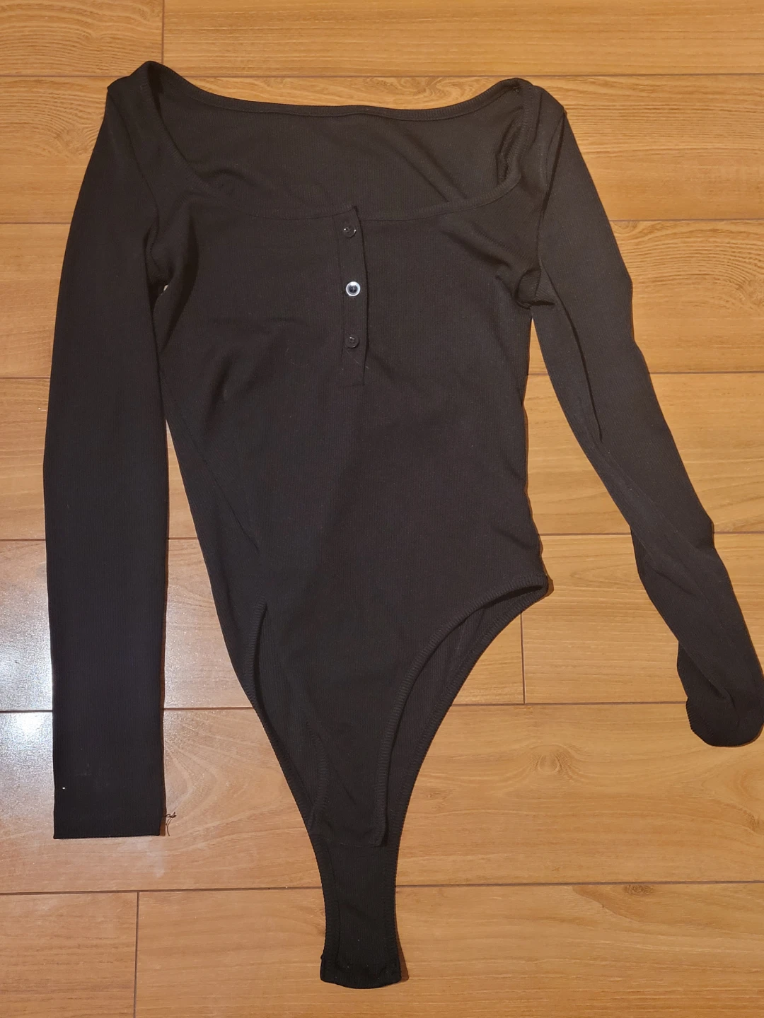 Black ribbed long sleeve bodysuit