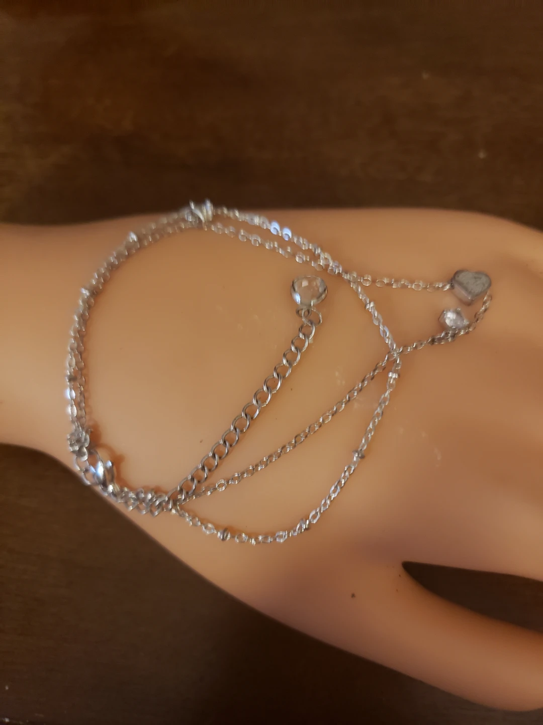 Silver-tone layered bracelet with charms
