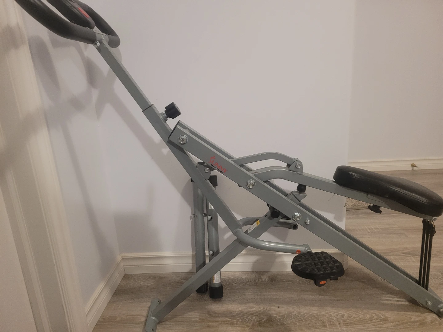 Sunny Health & Fitness Squat Assist Row-n-Ride Trainer