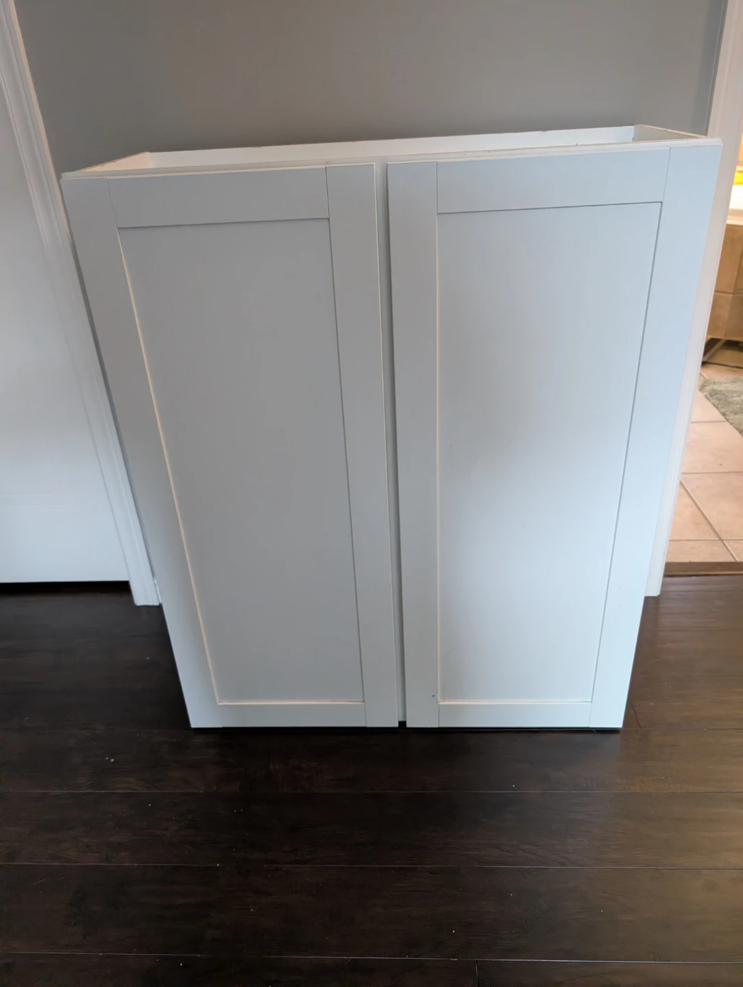 White Two-Door Cabinet with Shelves