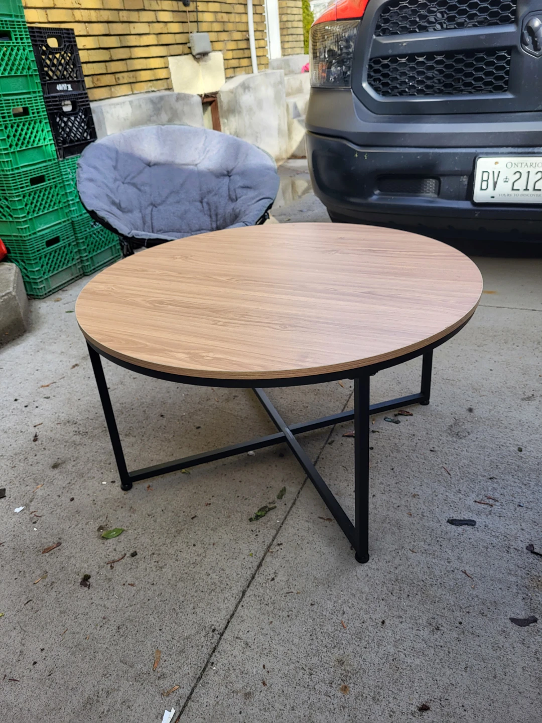 Round Wood Coffee Table with Black Metal Base