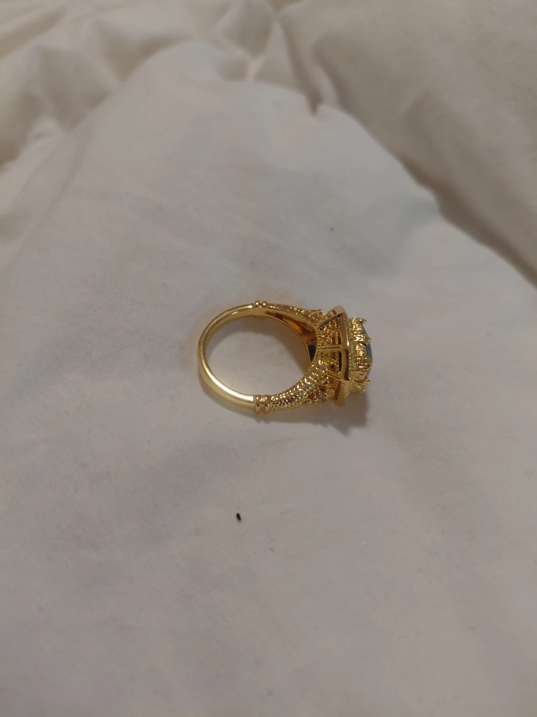 Gold-toned statement ring with dark blue stone - photo 2
