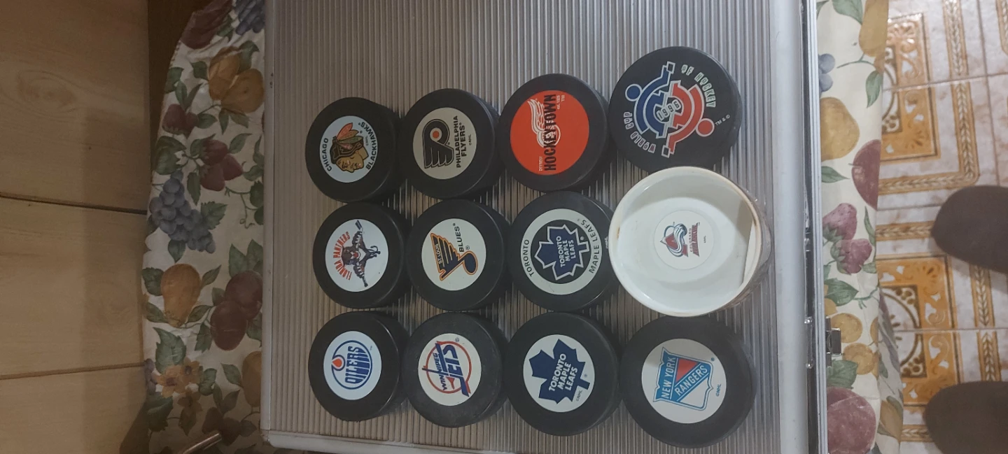 Collection of 12 NHL Hockey Pucks
