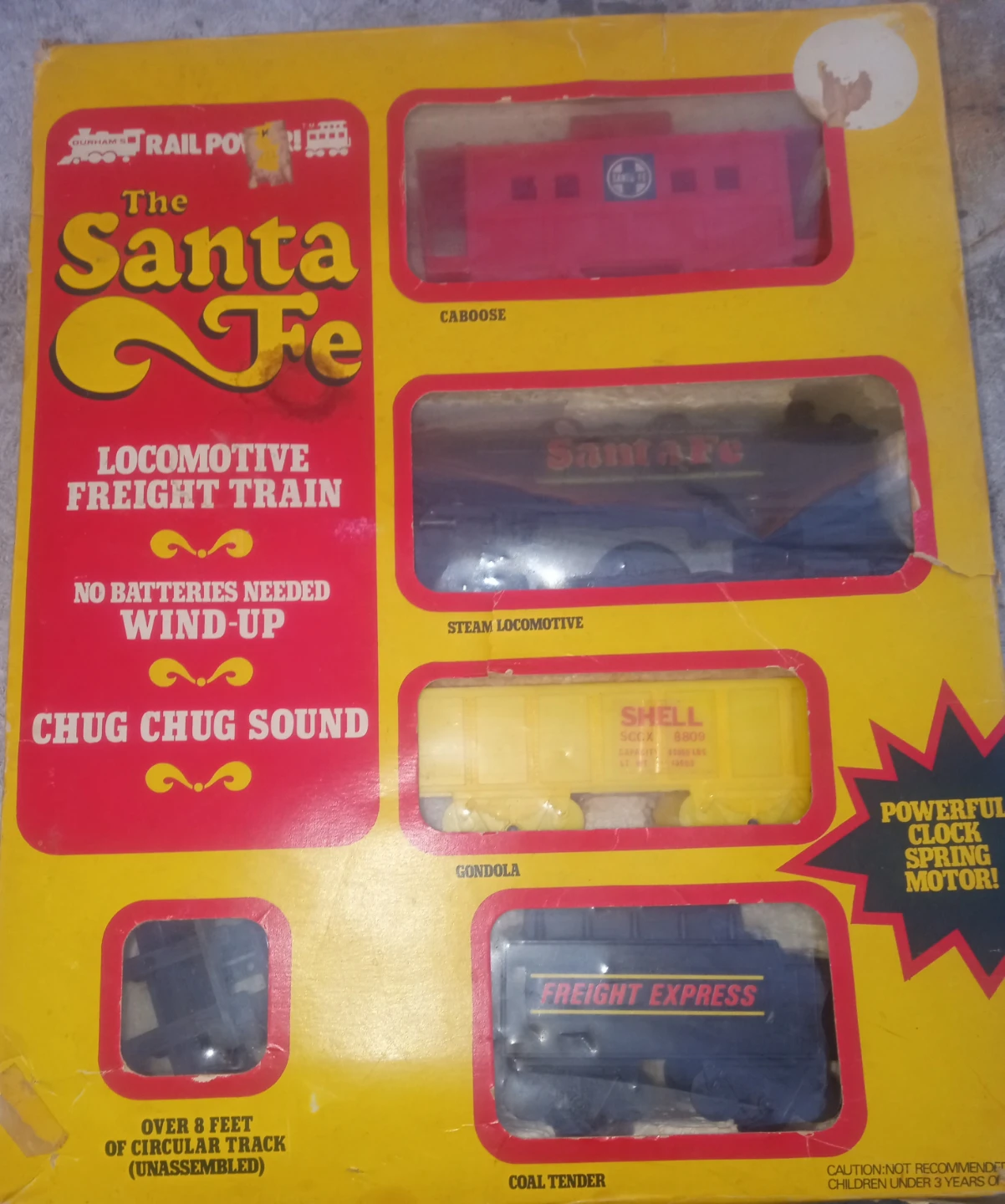The vintage Santa Fe Wind-Up Locomotive Freight Train Set