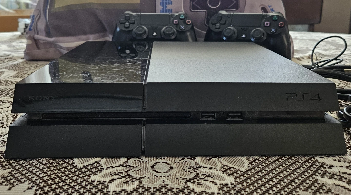 Sony PlayStation 4 (PS4) Console with 2 Controllers - photo 2