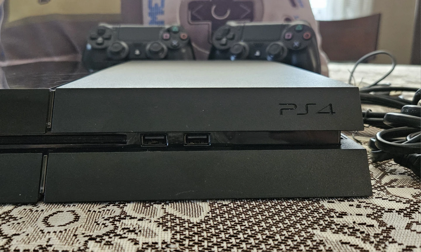 Sony PlayStation 4 (PS4) Console with 2 Controllers - photo 3