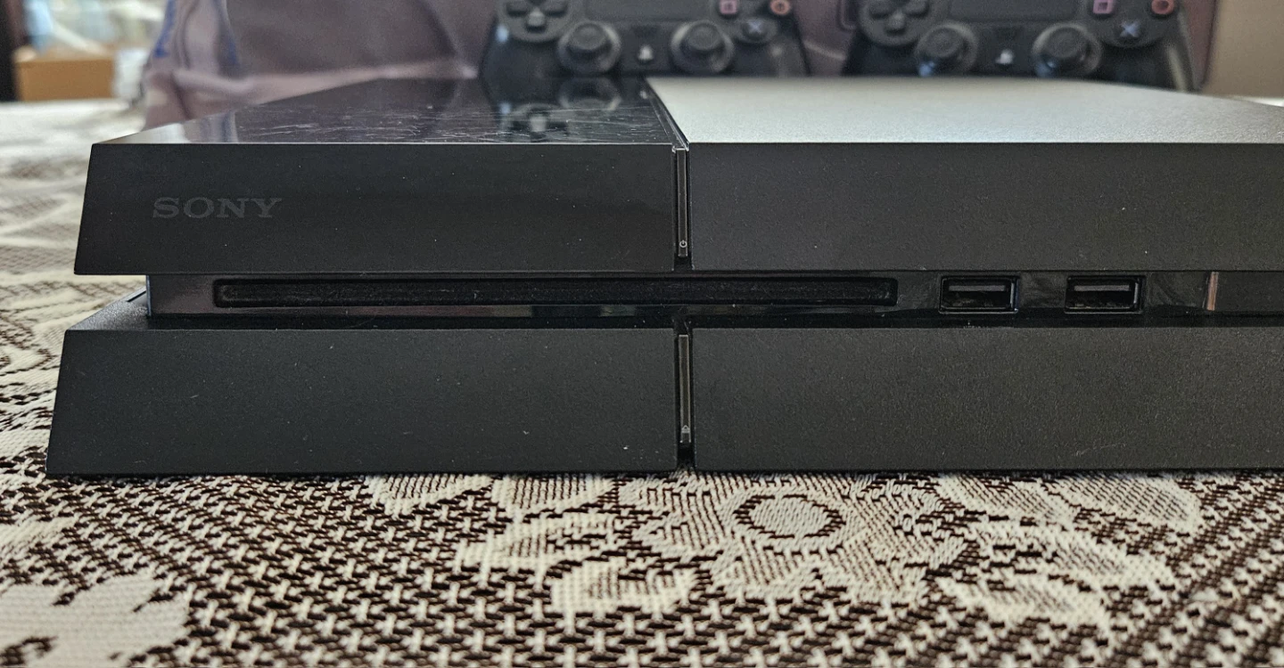Sony PlayStation 4 (PS4) Console with 2 Controllers - photo 4
