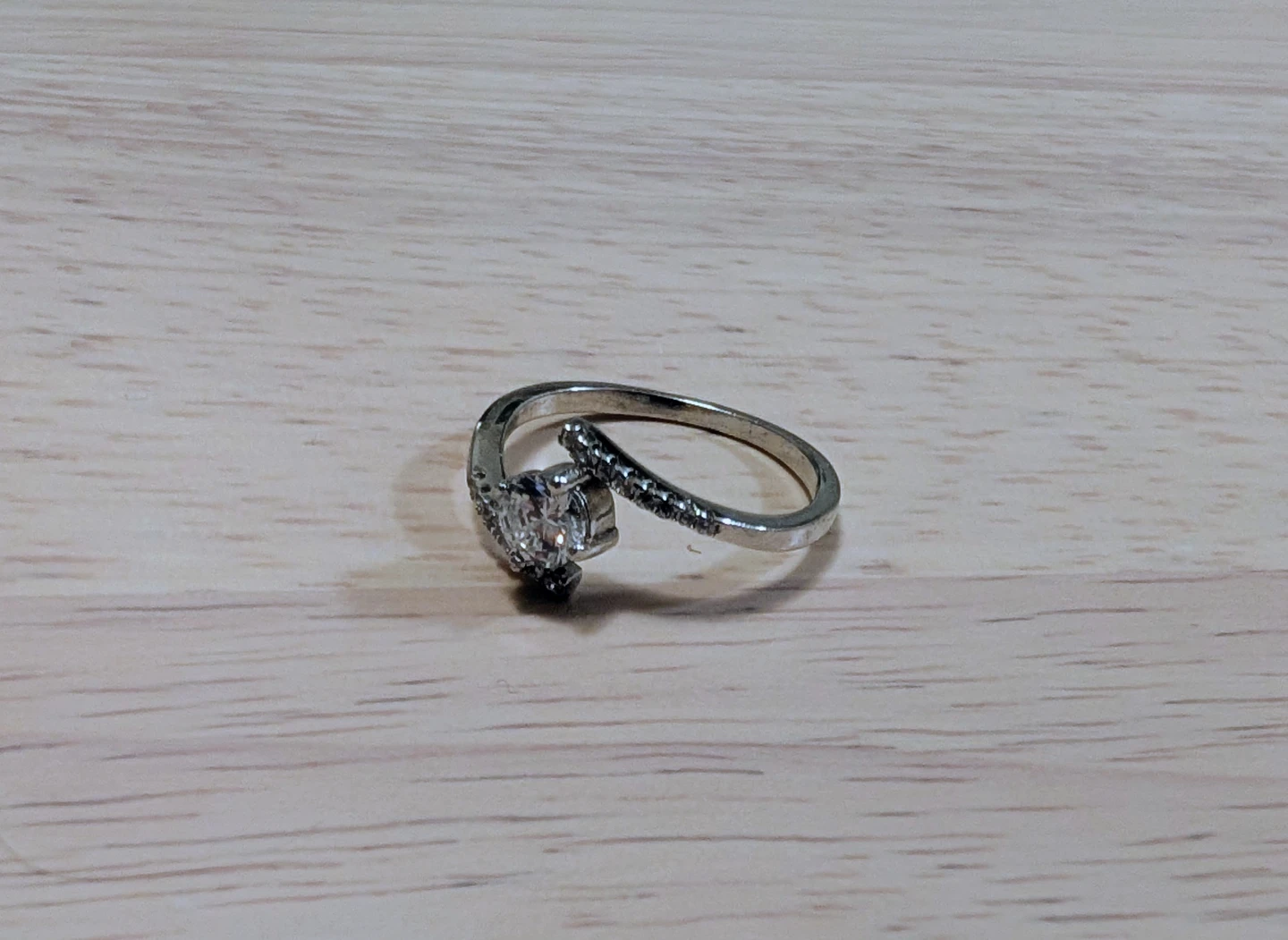 Brand New Silver-tone ring with clear stones