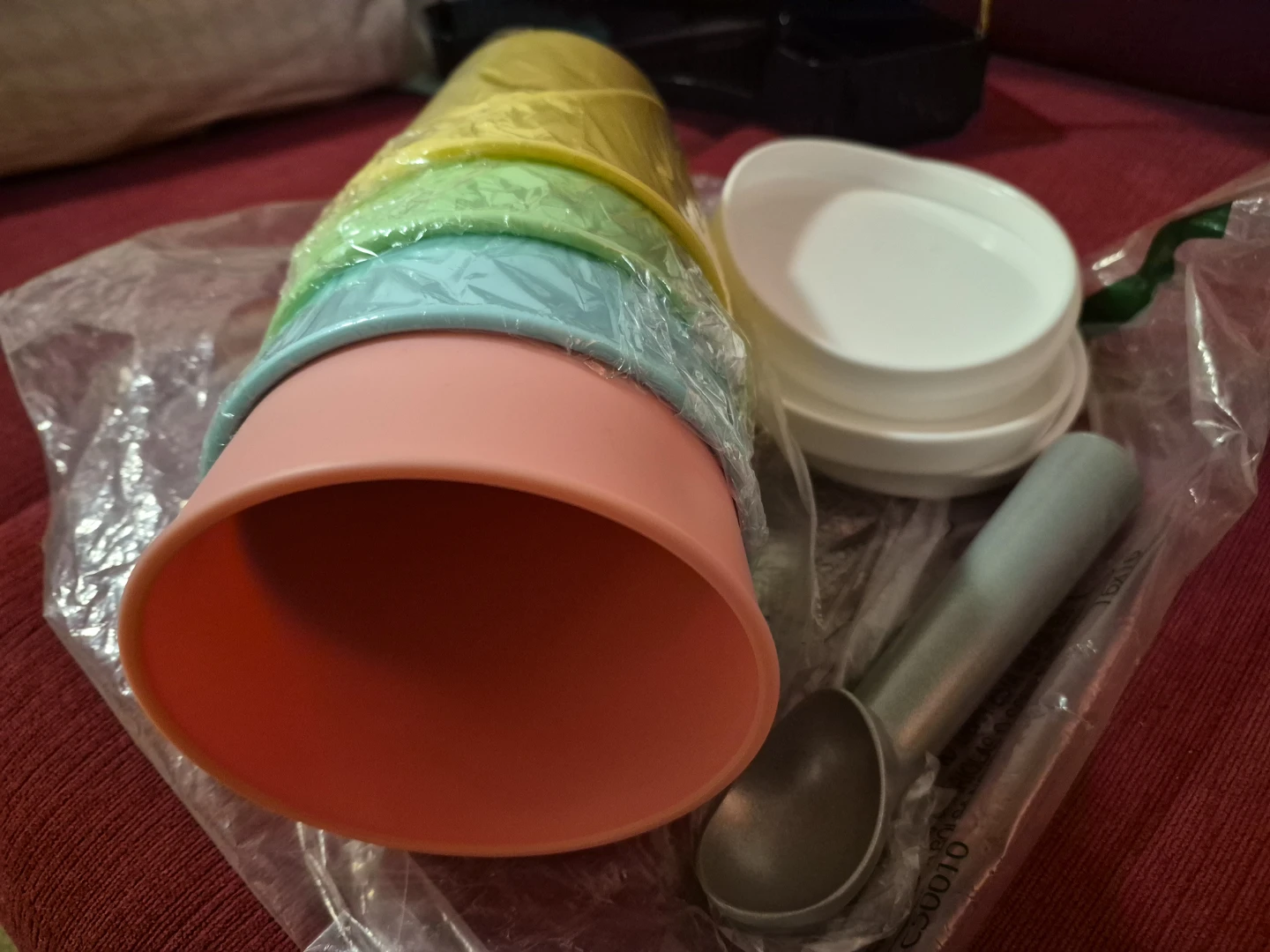 Set of 4 colourful ice cream cups with scoop