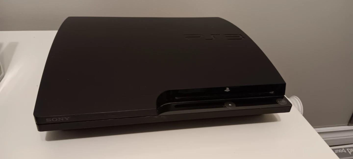 Sony PlayStation 3 Console Bundle with Games and Controllers - photo 2