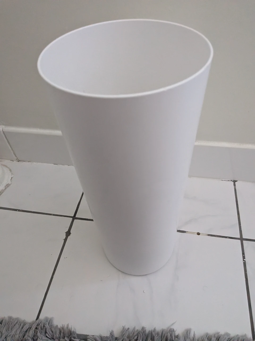 White Plastic Trash Can