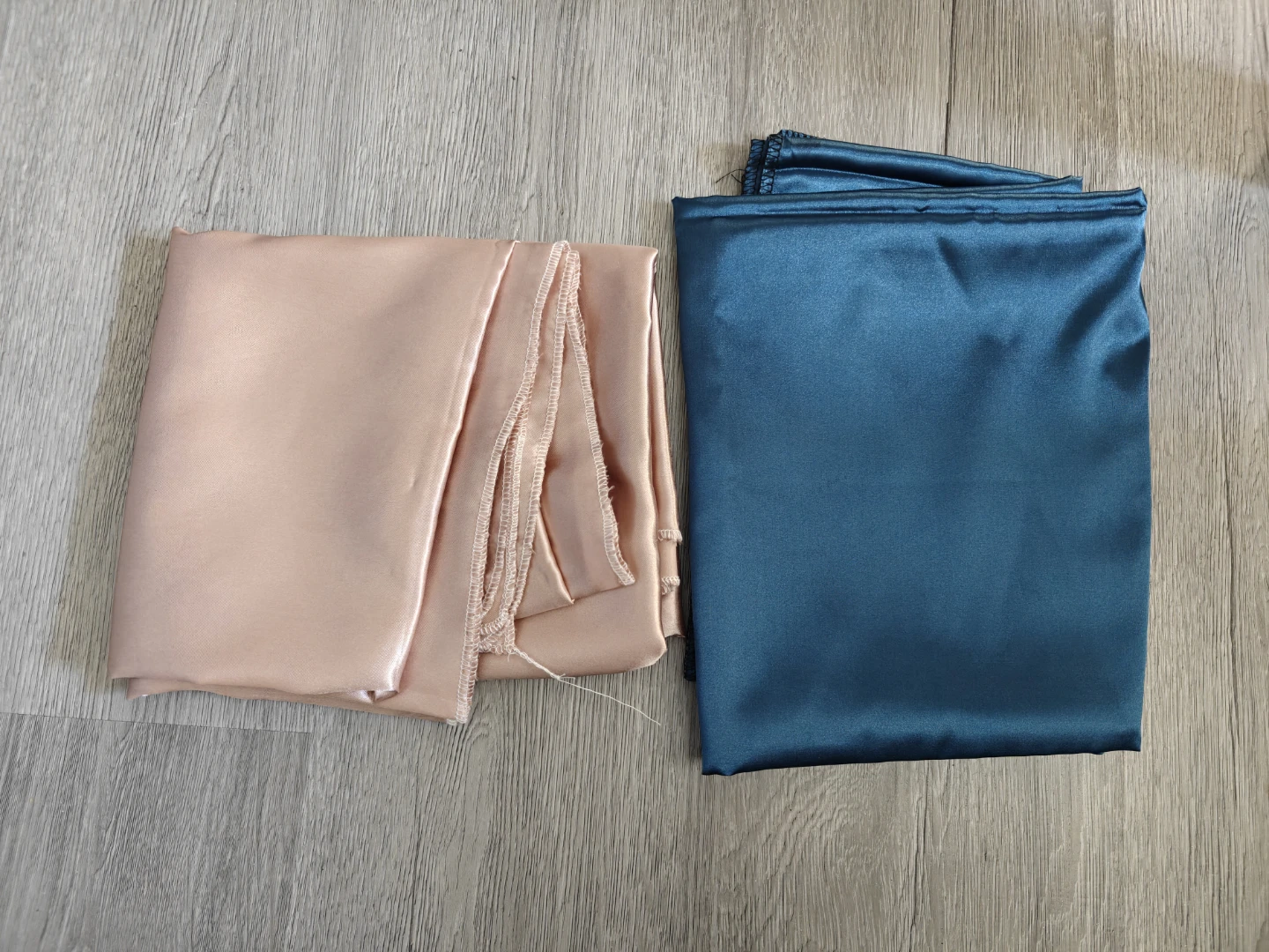 Two satin fabrics - rose gold and teal