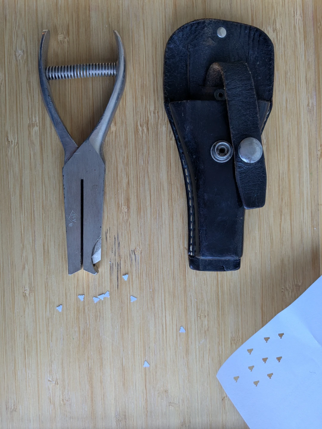 Vintage Metal Ticket Puncher with Leather Holster