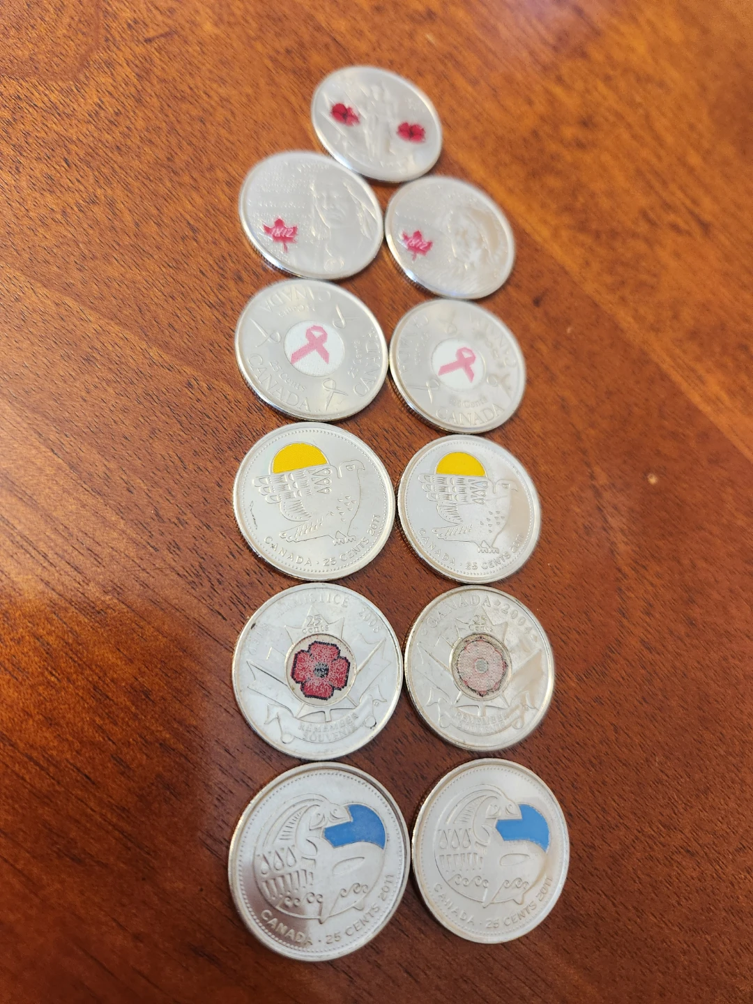 Collection of 11  Canadian Quarter Coins