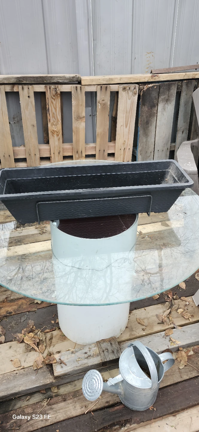Black Rectangular Planter with Hanging Hooks. Price firm 15$