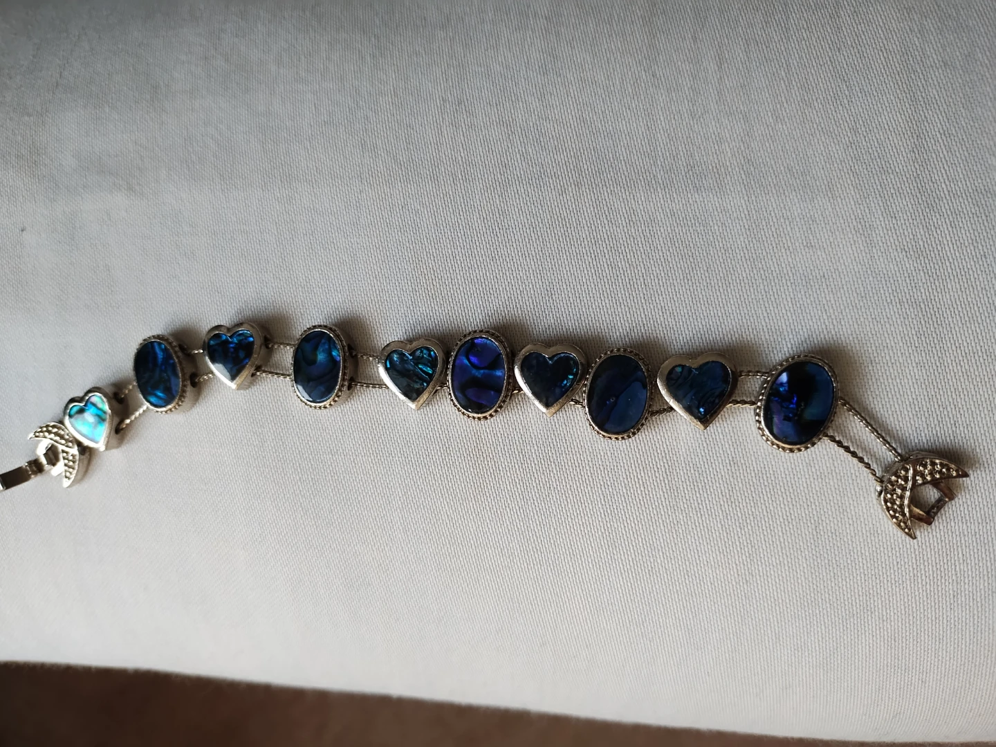 Silver tone bracelet with abalone shell hearts and ovals - photo 2