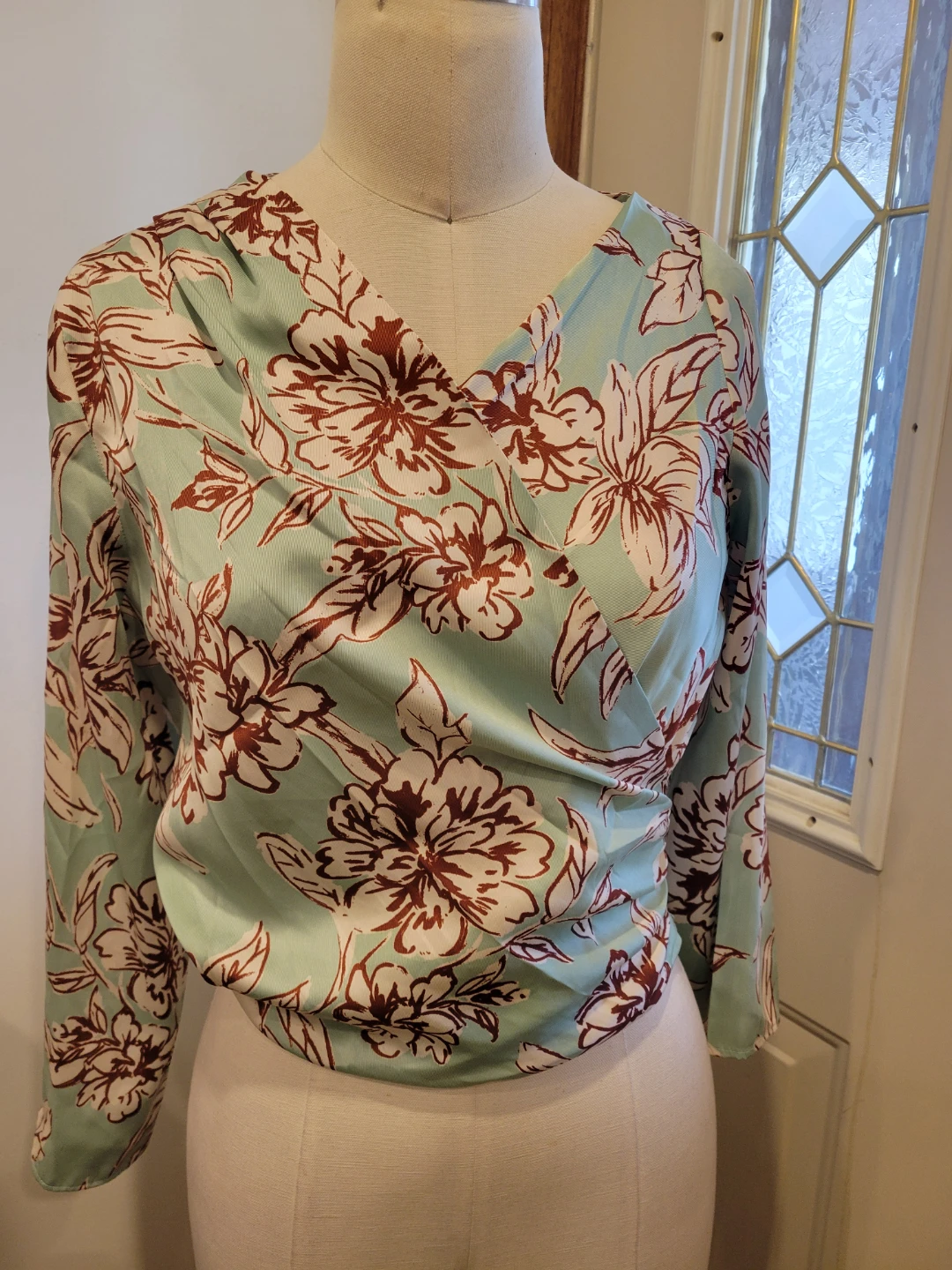 Mint floral wrap blouse