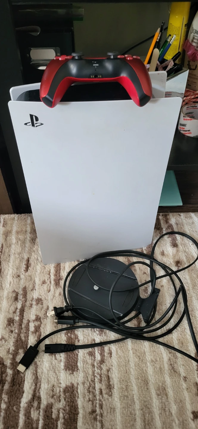 PlayStation 5 Console with Red Controller and Stand