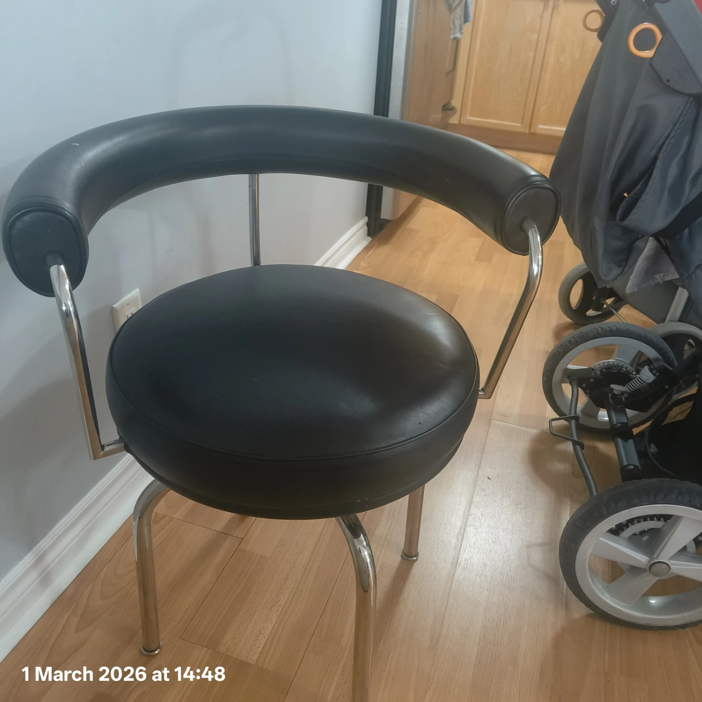 Black Faux Leather Swivel Chair with Chrome Base