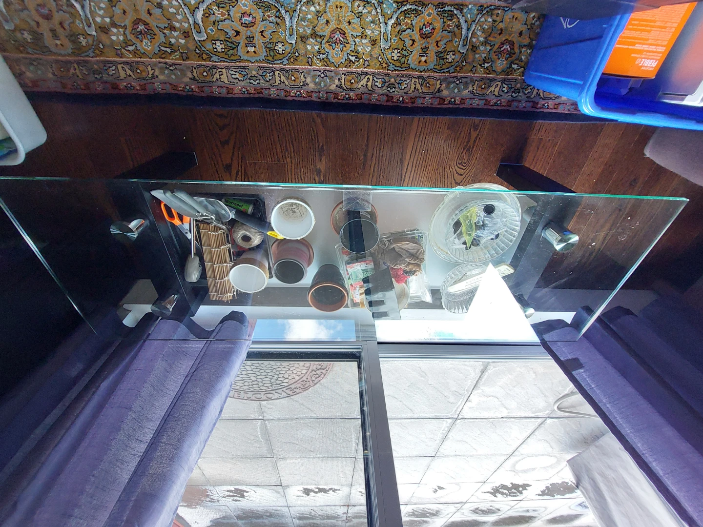 Glass top coffee table with black legs - photo 2