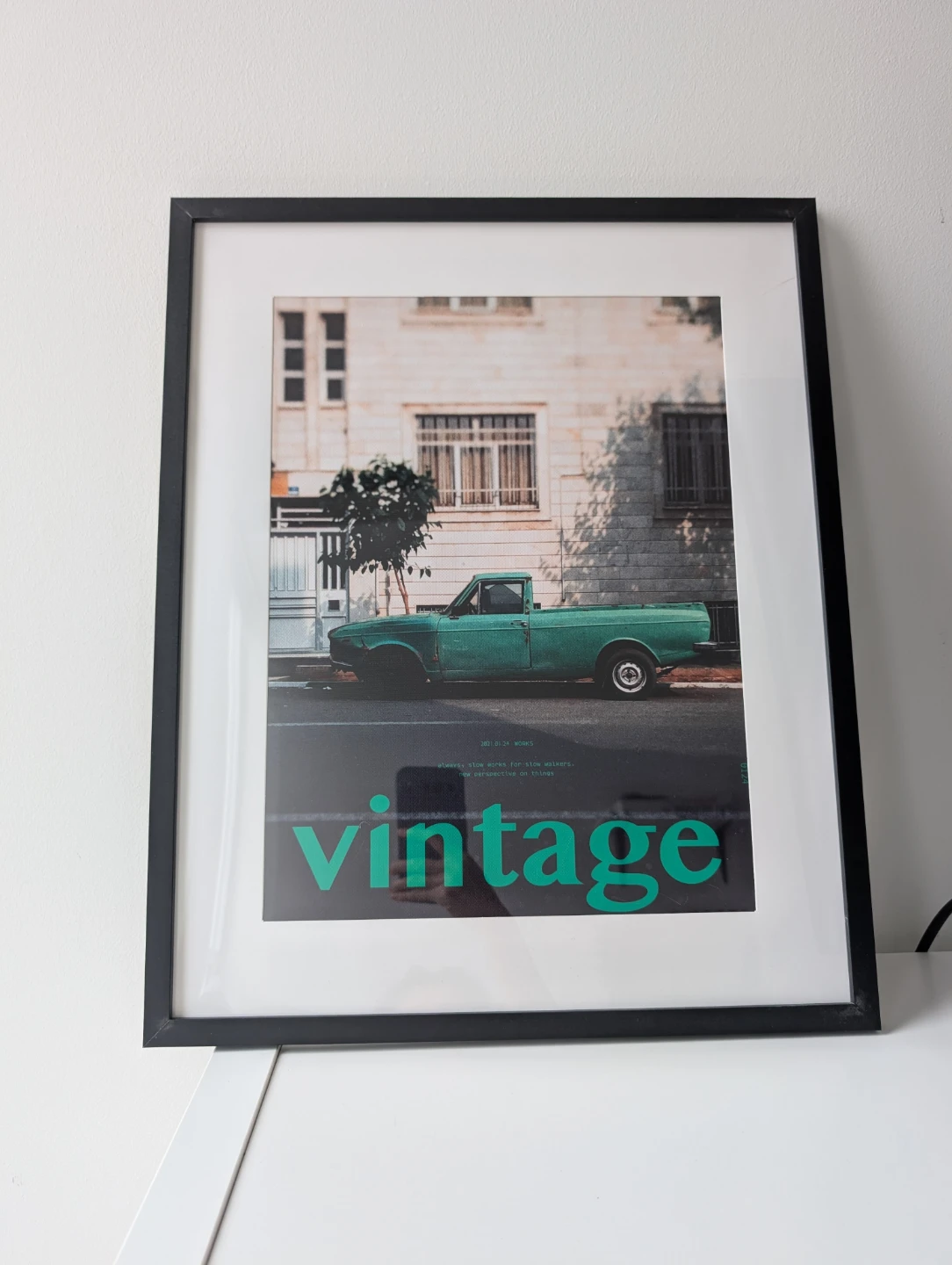 framed green Paykan pickup truck vintage print in black frame