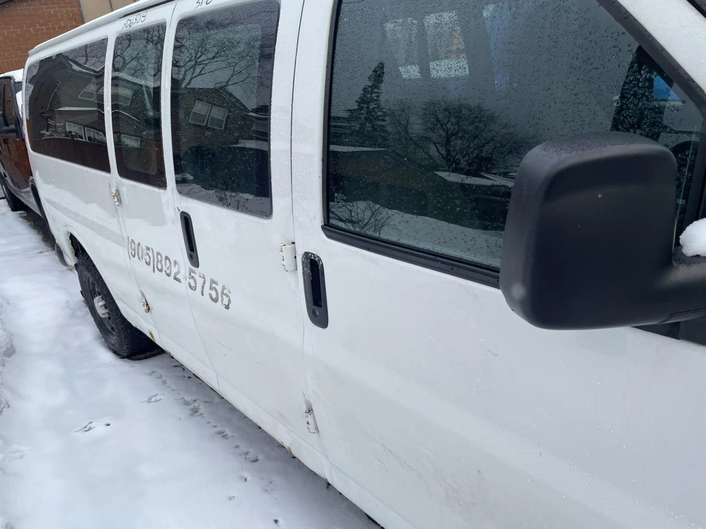 White Chevrolet Express Cargo Van