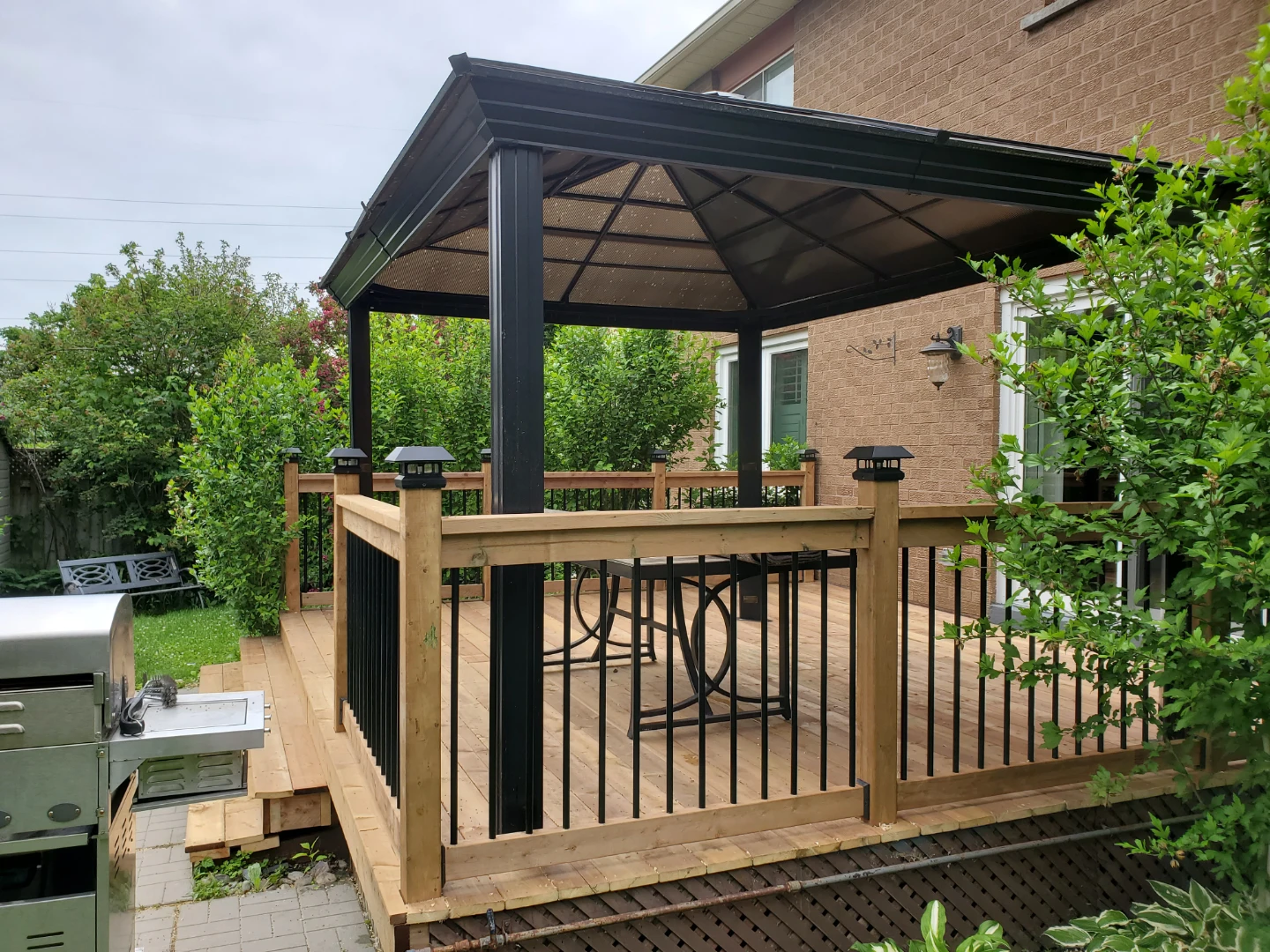 Wooden Deck with Gazebo and Lighting
