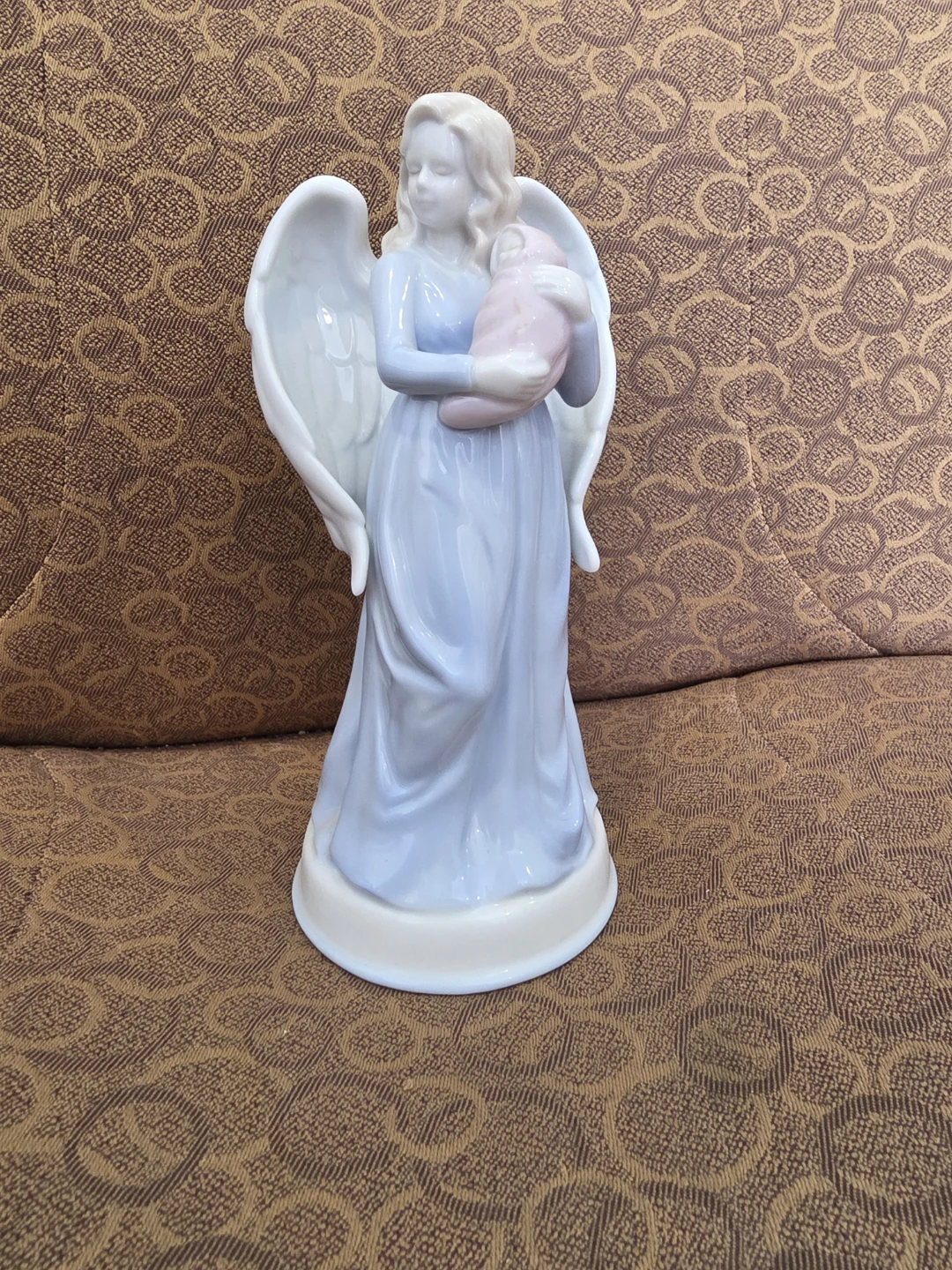 Ceramic Angel Holding Baby Figurine