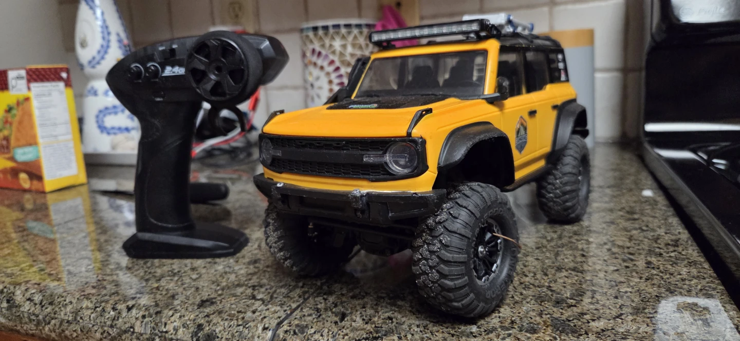 Yellow Remote Control RC crawler with Controller