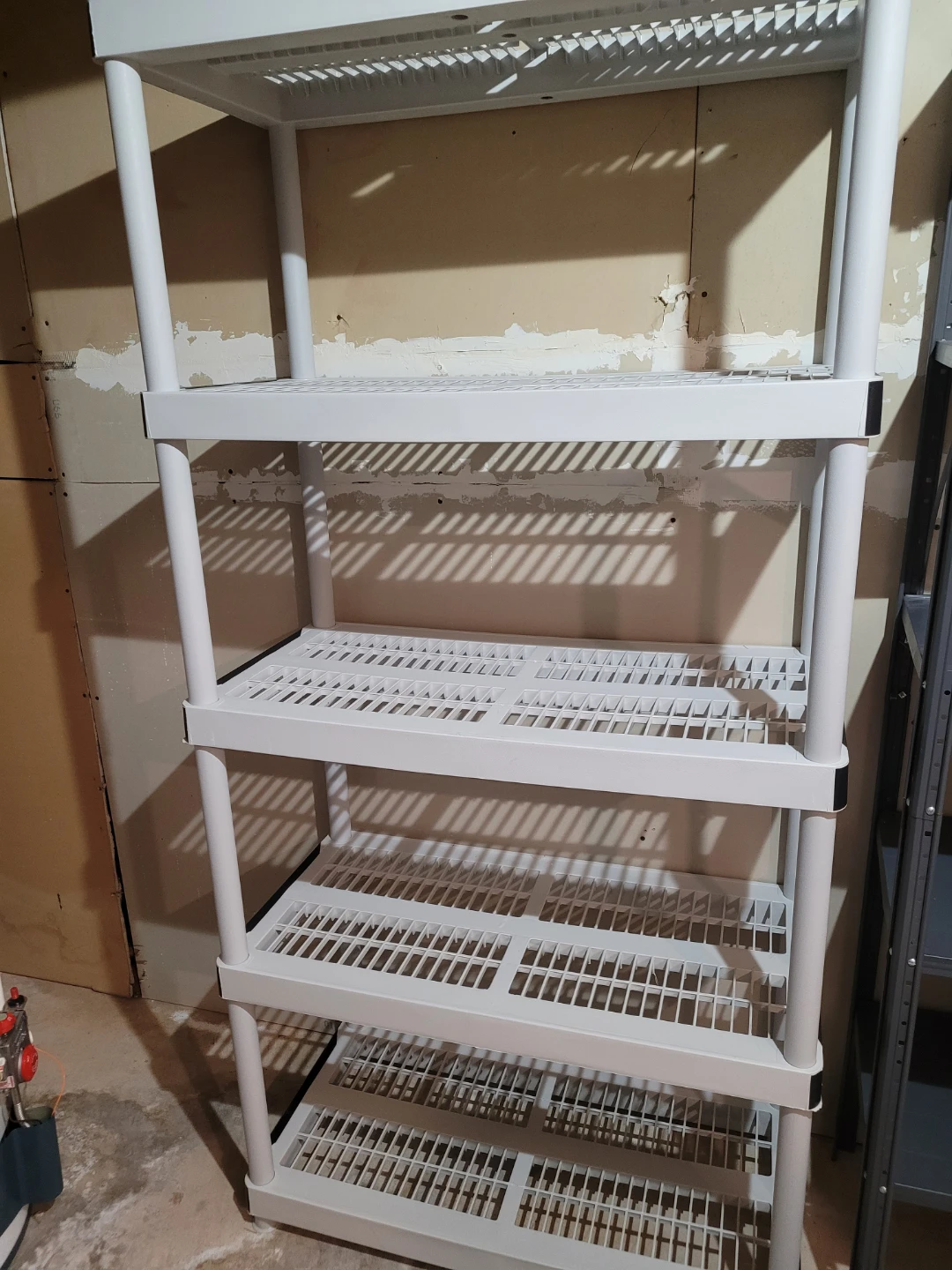 3- 5 Shelf Plastic Storage Unit and 2- 4 shelves  $15.00 each