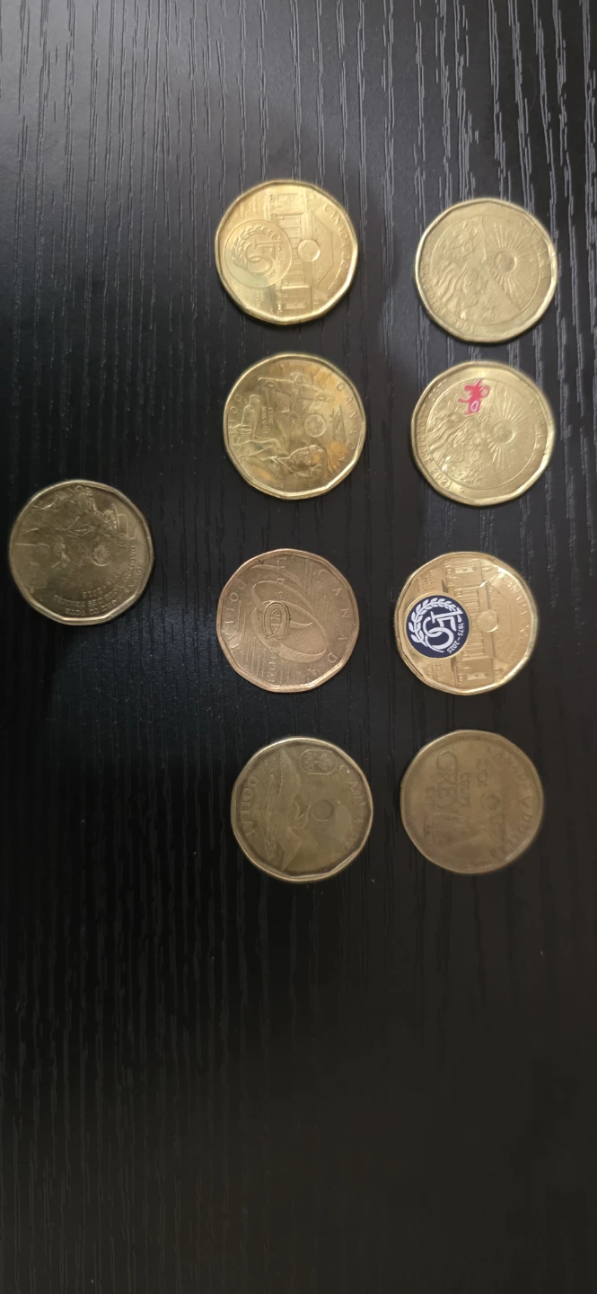 Collection of 9 Canadian Loonie & Toonie Coins