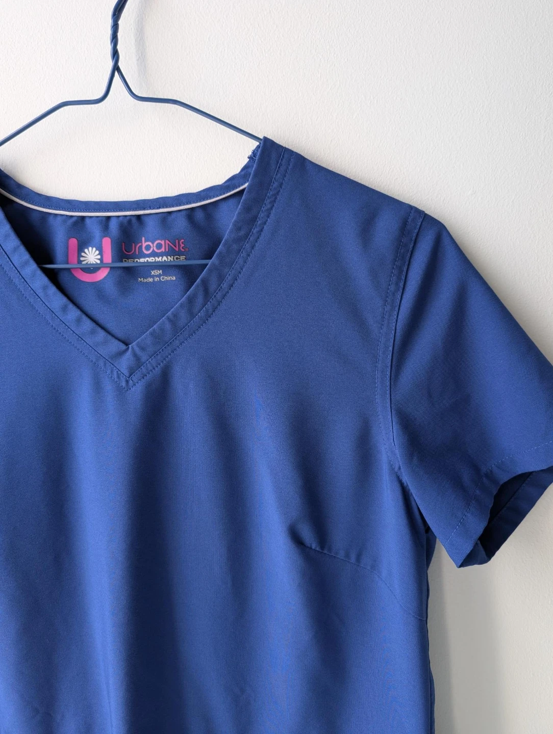 Urbane Performance Scrub Top