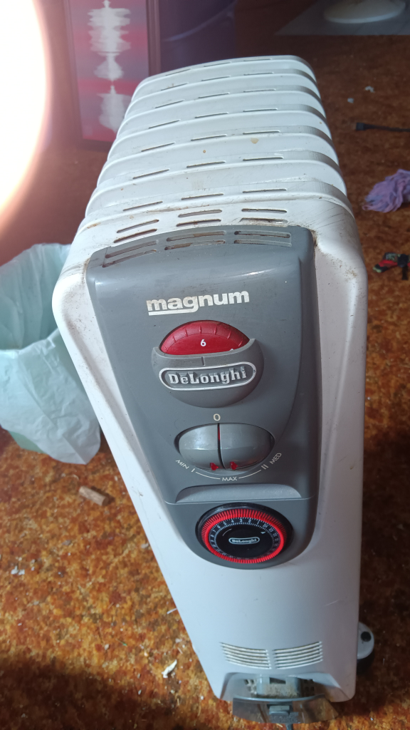 Portable oil filled heater