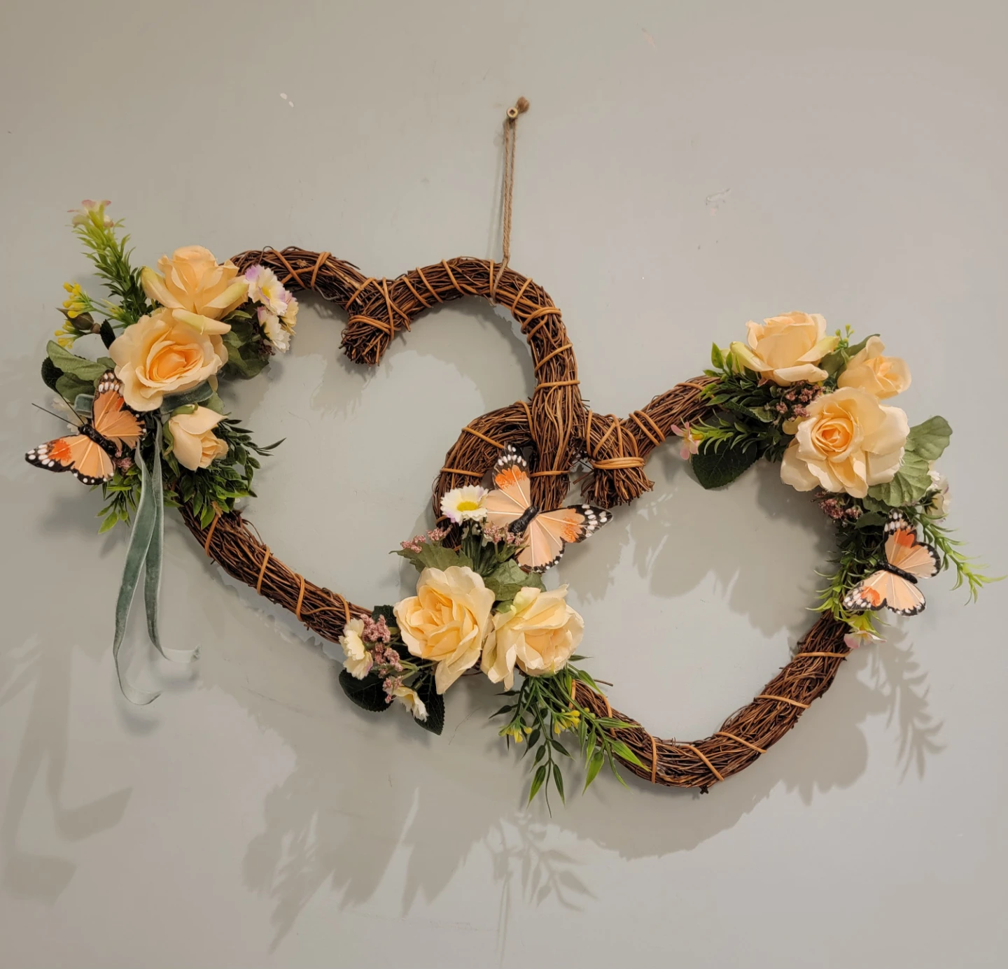Interlocking Heart Wreath with Roses and Butterflies