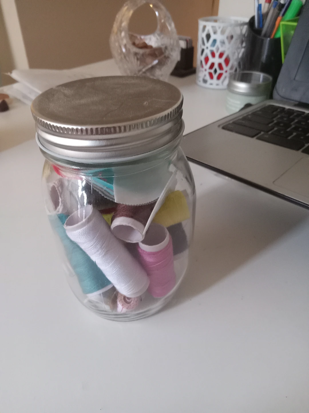 Glass Jar with Sewing Supplies