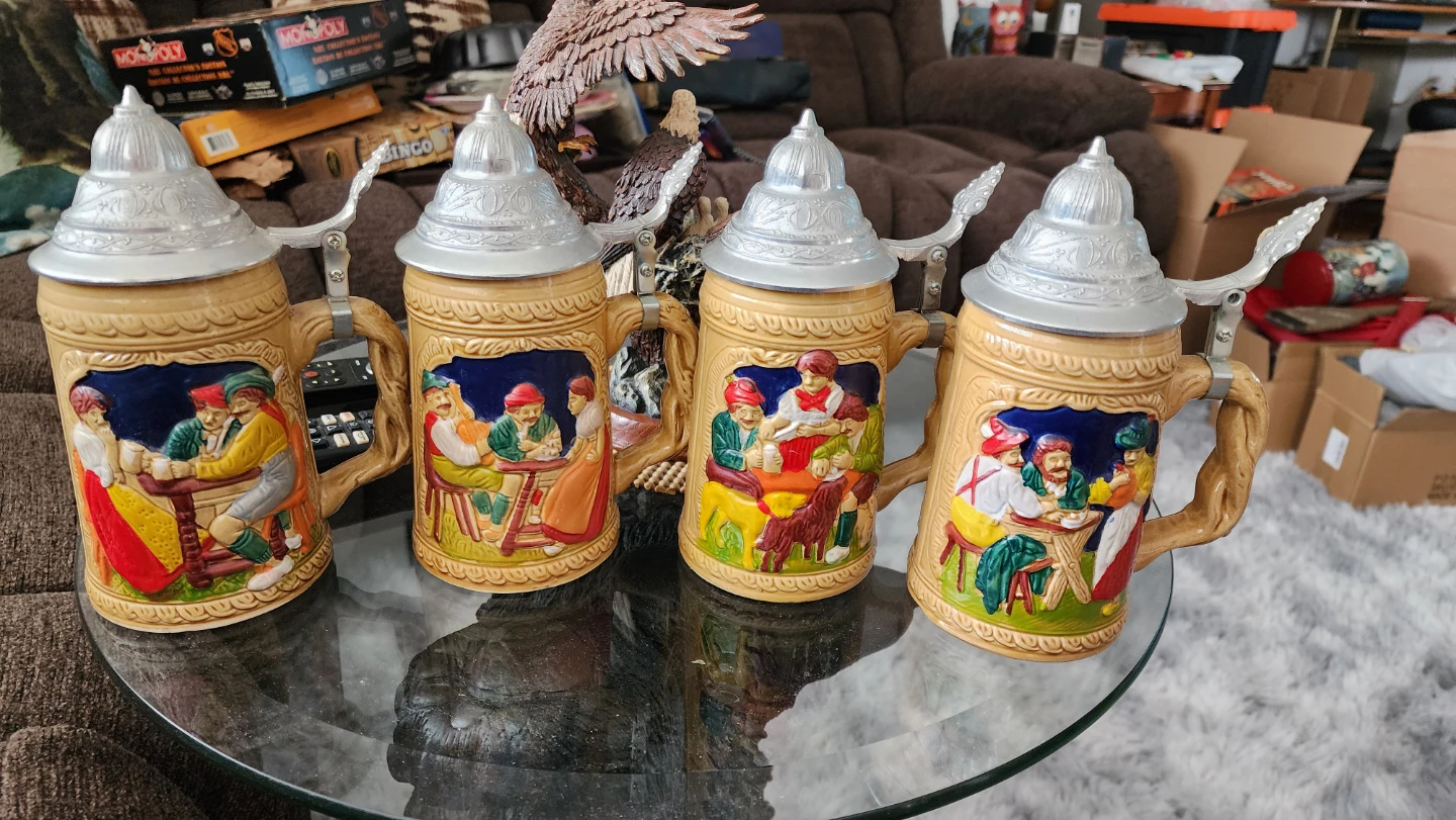 Set of 4 German Beer Steins with Pewter Lids