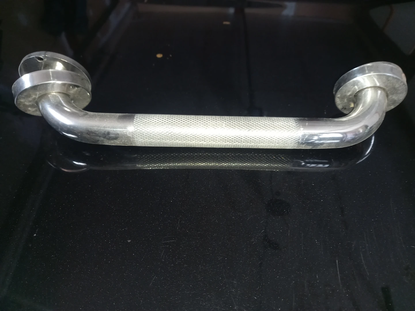 Chrome grab bar with knurled grip