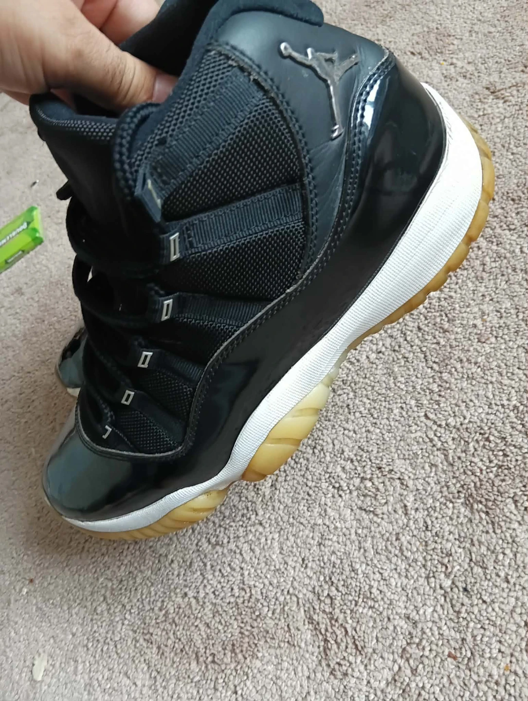 Air Jordan 11 Retro Black Patent Leather Sneakers